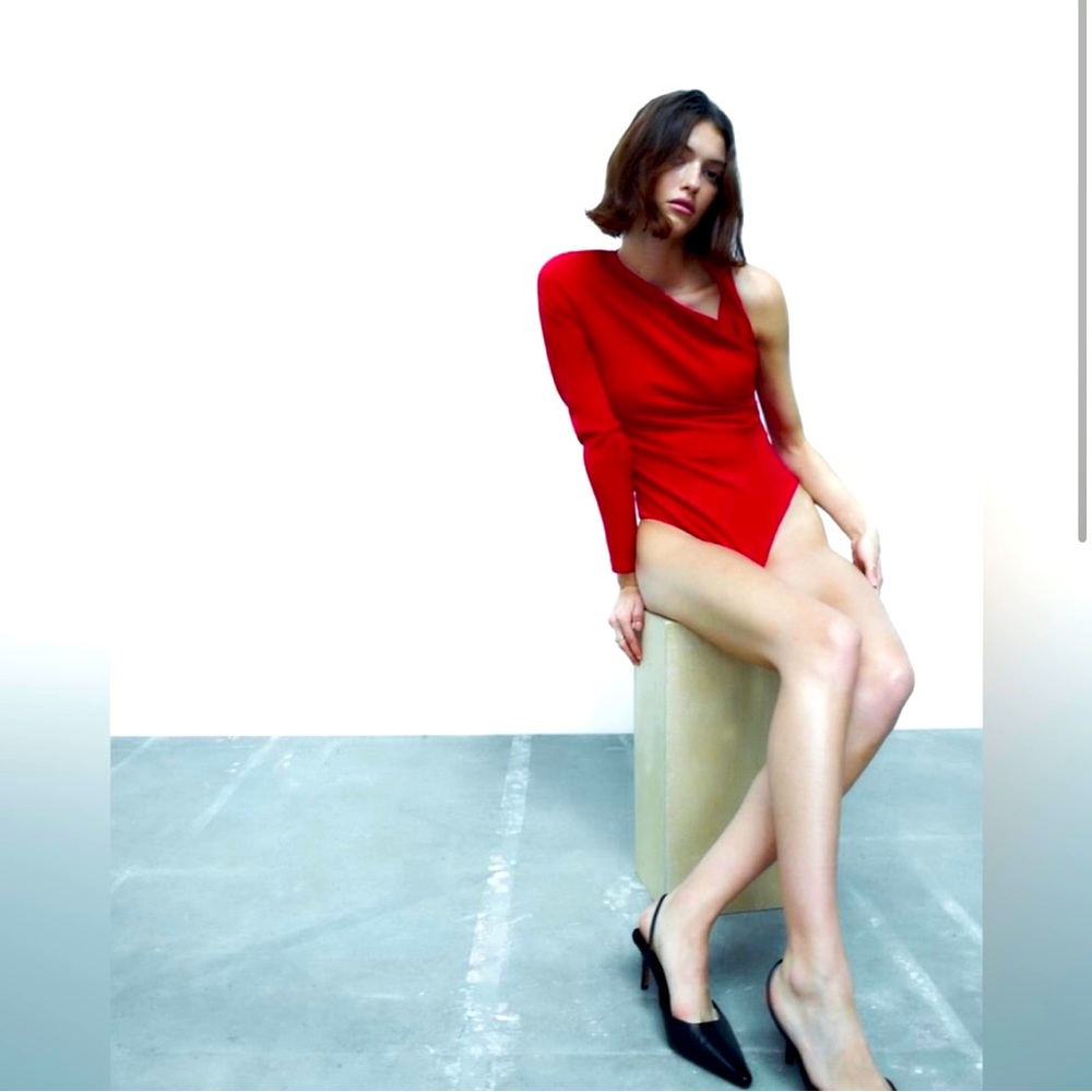 Xs long sleeve bodysuit in red.